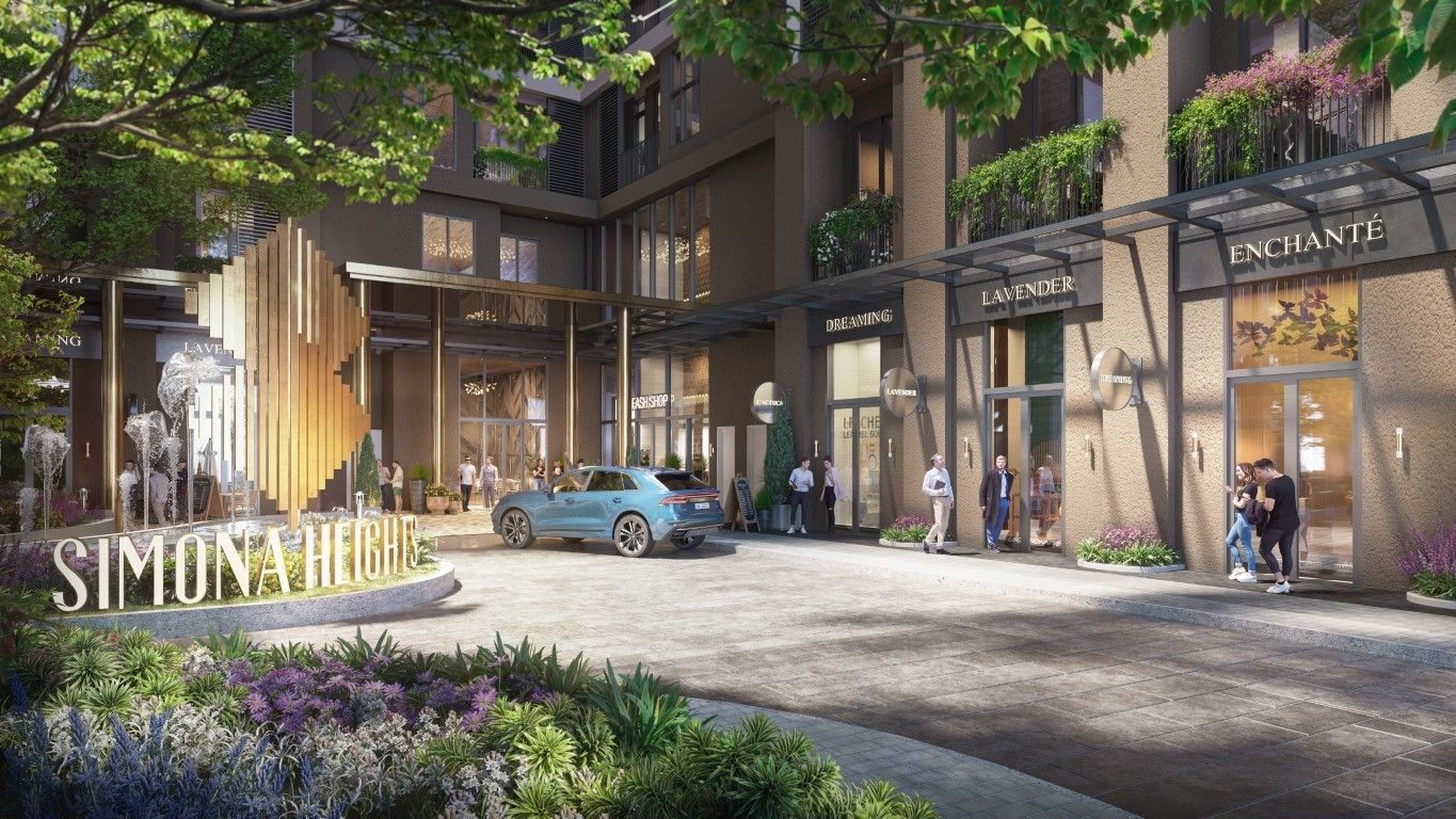Sảnh đón cao cấp Simona Heights Quy Nhơn với biển tên dự án và lối xe vào